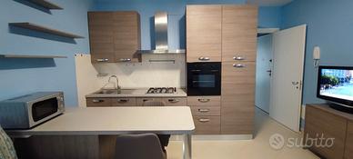 Bilocale in villette a schiera e posto Auto