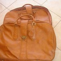 Carrellino con valigie