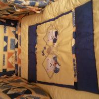 Trapunta e paracolpi per lettino