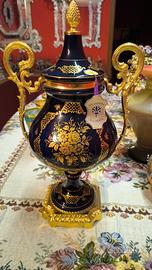 Poutiche in porcellana e bronzo