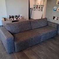 Divano 4 posti  in tessuto con sedute scorrevoli 