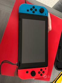 Nintendo Switch + Custodia + Giochi