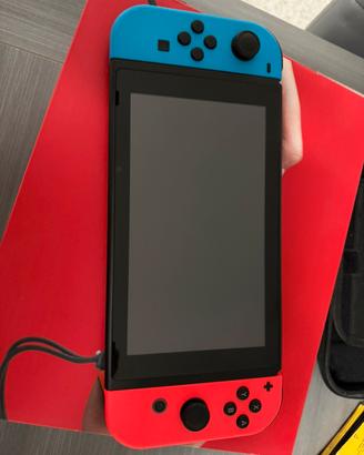 Nintendo Switch + Custodia + Giochi