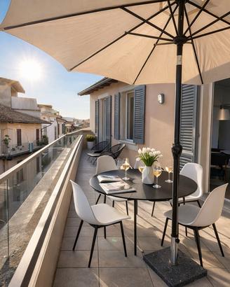 Attico con doppia terrazza e posto auto in centro