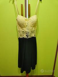abito giallo e nero. Buona vestibilità taglia M