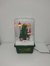 Teca natalizia decorativa con carillon e neve 