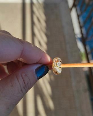 Trollbeads con scatola sui colori ambrati/oro