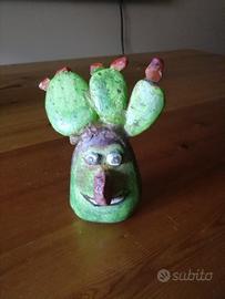 Faccia "pala di ficurinia" 