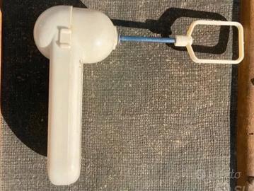 Sbattitore con una frusta