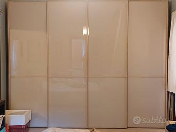 Armadio con quattro ante scorrevoli ,color rovere