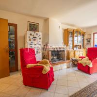 Villetta a schiera con giardino e posto auto