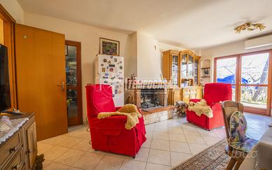 Villetta a schiera con giardino e posto auto