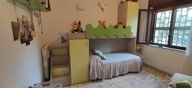 Cameretta con tre lettini