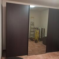 camera da letto e divano