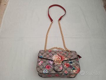 Borsetta marrone e multicolore floreale con catena