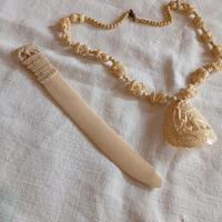 tagliacarte e collana