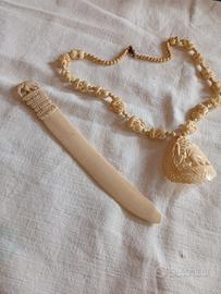 tagliacarte e collana