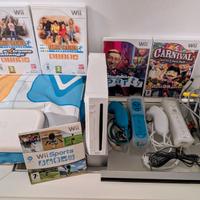 Wii + doppi comandi + tappetino + 5 giochi