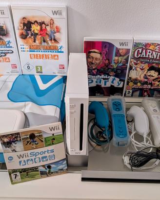 Wii + doppi comandi + tappetino + 5 giochi