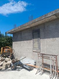 Terreno con deposito 