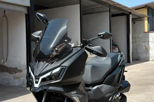 Sym ADX +TCS E5+