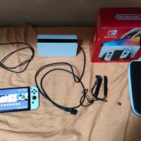 nintendo switch oled con pellicola, custodia e sd