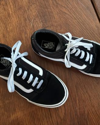 Vans Old Skool nere con banda bianca