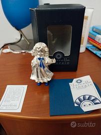 Bambolina Marcello Giorgio. Laminata in argento