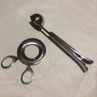 Apriuova+cucchiaino dosatore caffè c/clip chiusura