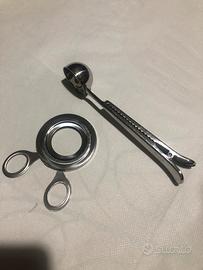 Apriuova+cucchiaino dosatore caffè c/clip chiusura