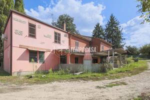 PORZIONE DI BIFAMILIARE DA RISTRUTTURARE A CASOLA