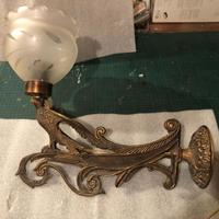 Lampada a muro in bronzo