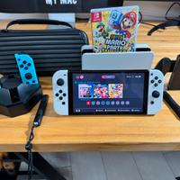 Nintendo Switch OLED + Mario Party + accessori