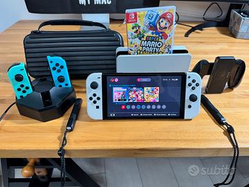 Nintendo Switch OLED + Mario Party + accessori