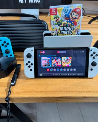Nintendo Switch OLED + Mario Party + accessori