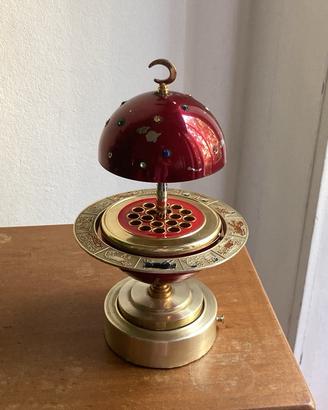 Portasigarette vintage a pianeta con carillon