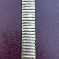 Swatch cinturino elastico col. Oro