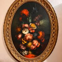 Grande quadro ovale con cornice dorata