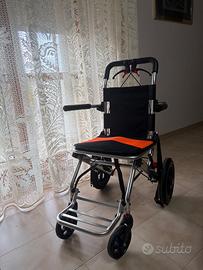 Sedia a rotelle pieghevole