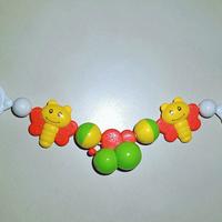 Gioco/sonaglio per passeggino, seggiolone, ovetto.