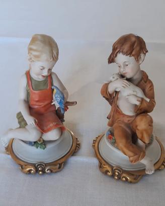 Statuette in ceramica Capodimonte Benacchio