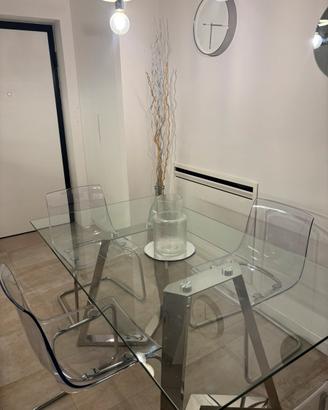 Tavolo da pranzo in vetro e acciaio