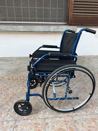 Sedia a rotelle pieghevole