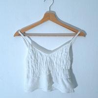 Top bianco con peplo