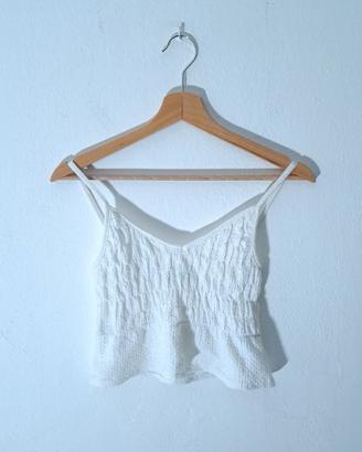 Top bianco con peplo