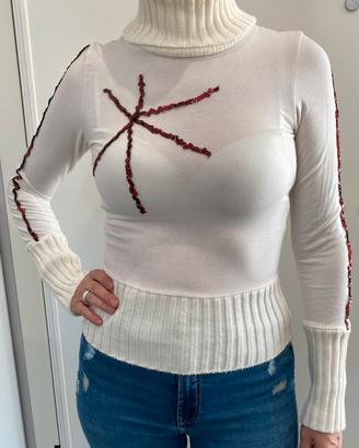 Maglia a collo alto color panna con paillettes