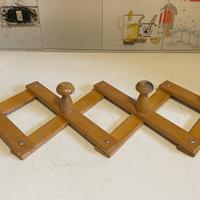 # Attaccapanni in legno a fisarmonica