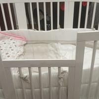 culla ovale di legno 