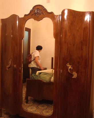 stanza da letto, armadio e letto