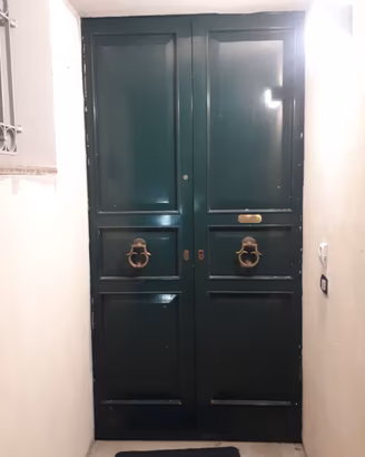 Portone ingresso in legno